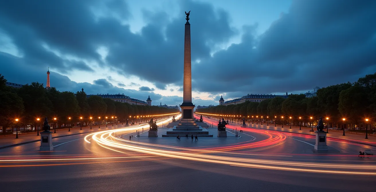 Wide angle view of Place de la Concorde showing modern traffic around historical monuments